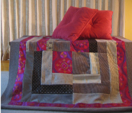 Quilt & Red Pillows